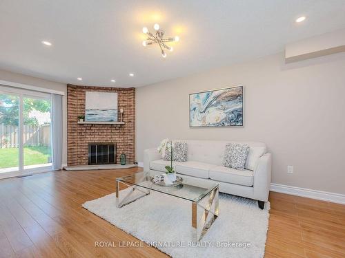 4867 Rathkeale Rd, Mississauga, ON - Indoor Photo Showing Living Room With Fireplace