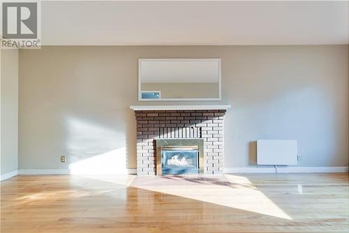 45 Macbeath Avenue, Moncton, NB - Indoor Photo Showing Living Room With Fireplace