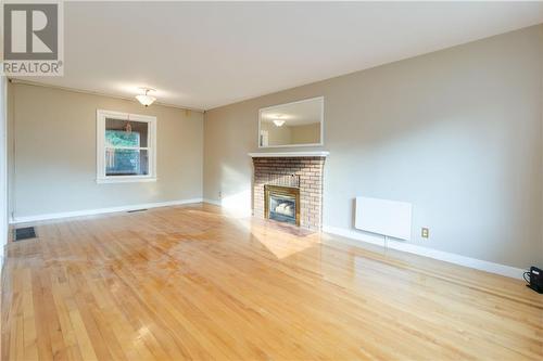 45 Macbeath Avenue, Moncton, NB - Indoor Photo Showing Living Room With Fireplace