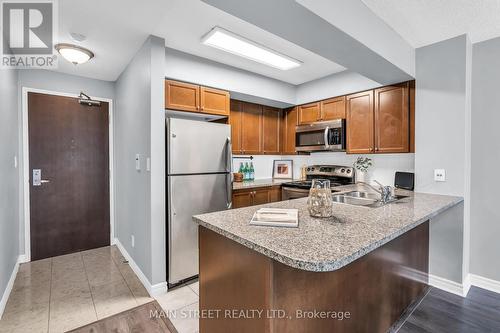 2003 - 335 Rathburn Road W, Mississauga (City Centre), ON - Indoor Photo Showing Kitchen With Stainless Steel Kitchen With Double Sink