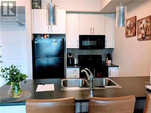 306 - 5010 Corporate Drive, Burlington (Uptown), ON - Indoor Photo Showing Kitchen With Double Sink