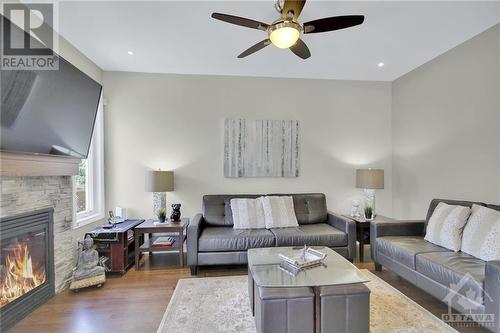 128 Lily Pond Street, Ottawa, ON - Indoor Photo Showing Living Room With Fireplace