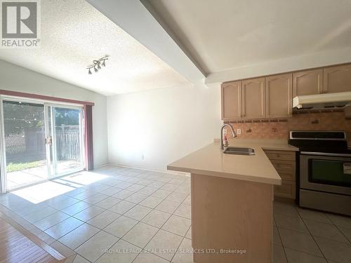 4908 Long Acre Drive, Mississauga (Churchill Meadows), ON - Indoor Photo Showing Kitchen With Double Sink