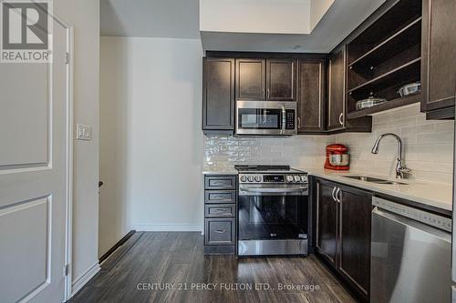 131 - 1081 Danforth Road, Toronto (Eglinton East), ON - Indoor Photo Showing Kitchen With Double Sink