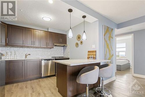 Breakfast bar. - 900 Dynes Road Unit#2206, Ottawa, ON - Indoor Photo Showing Kitchen With Upgraded Kitchen