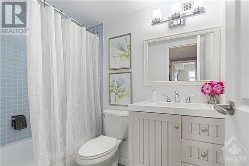 Cute! Additional closet space beside the bathroom in hallway. - 900 Dynes Road Unit#2206, Ottawa, ON - Indoor Photo Showing Bathroom