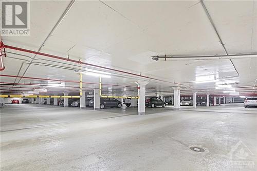 Underground parking garage. - 900 Dynes Road Unit#2206, Ottawa, ON - Indoor Photo Showing Garage