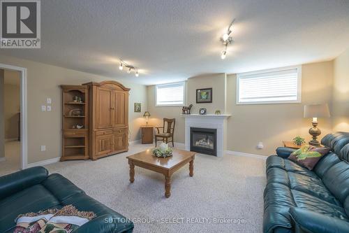 28 - 2100 Denview Avenue, London, ON - Indoor Photo Showing Living Room With Fireplace