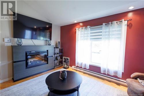 91 Dominique, Grand-Sault/Grand Falls, NB - Indoor Photo Showing Living Room With Fireplace