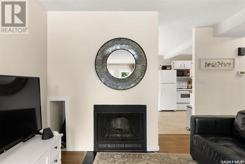 7306 Dalgliesh Drive, Regina, SK - Indoor Photo Showing Living Room With Fireplace