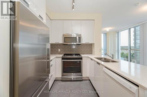 602 - 55 Eglinton Avenue W, Mississauga (Hurontario), ON - Indoor Photo Showing Kitchen With Double Sink With Upgraded Kitchen