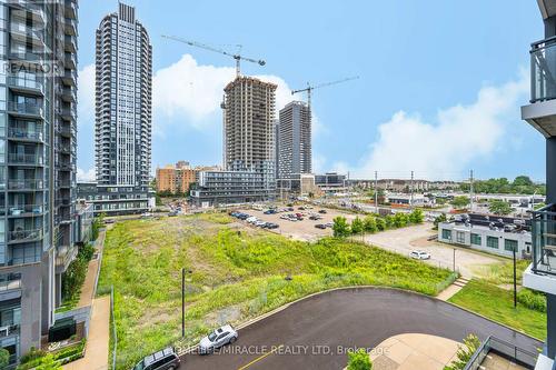 602 - 55 Eglinton Avenue W, Mississauga (Hurontario), ON - Outdoor With Balcony With Facade