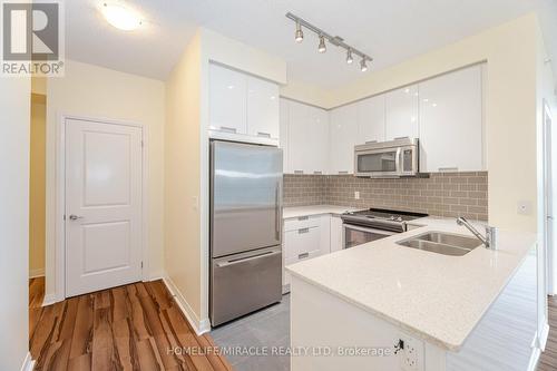 602 - 55 Eglinton Avenue W, Mississauga (Hurontario), ON - Indoor Photo Showing Kitchen With Double Sink With Upgraded Kitchen