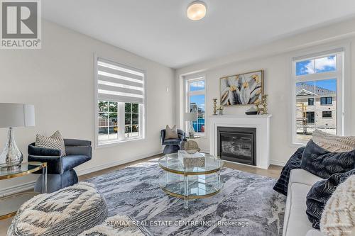 40 Sandhill Crescent, Adjala-Tosorontio (Colgan), ON - Indoor Photo Showing Living Room With Fireplace