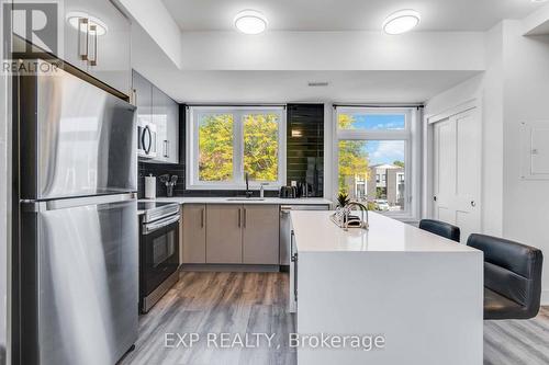 312 - 6065 Mcleod Road N, Niagara Falls, ON - Indoor Photo Showing Kitchen With Upgraded Kitchen