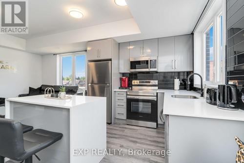 312 - 6065 Mcleod Road N, Niagara Falls, ON - Indoor Photo Showing Kitchen With Upgraded Kitchen