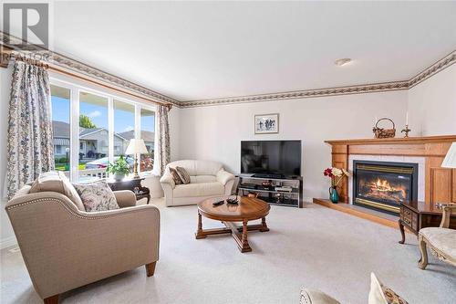 5700 Blackwell Sideroad Unit# 52, Sarnia, ON - Indoor Photo Showing Living Room With Fireplace