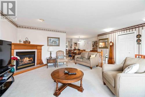 5700 Blackwell Sideroad Unit# 52, Sarnia, ON - Indoor Photo Showing Living Room With Fireplace