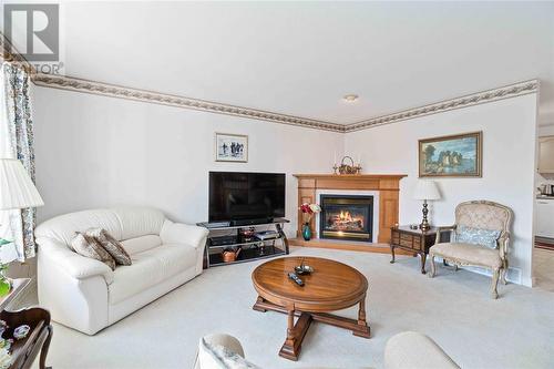 5700 Blackwell Sideroad Unit# 52, Sarnia, ON - Indoor Photo Showing Living Room With Fireplace