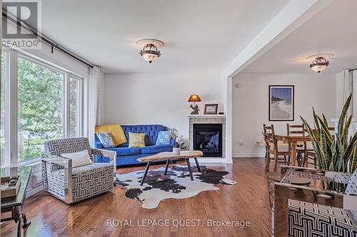 8 South Island Trail, Ramara (Brechin), ON - Indoor Photo Showing Living Room With Fireplace