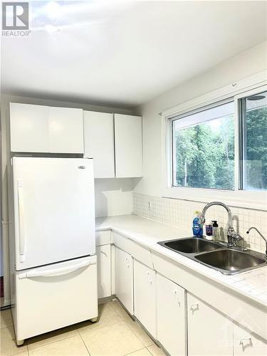 5437 Bank Street, Ottawa, ON - Indoor Photo Showing Kitchen With Double Sink