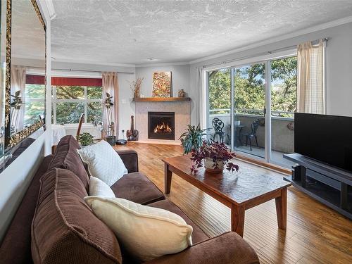 301-1361 Hillside Ave, Victoria, BC - Indoor Photo Showing Living Room With Fireplace