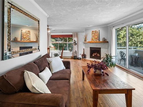 301-1361 Hillside Ave, Victoria, BC - Indoor Photo Showing Living Room With Fireplace