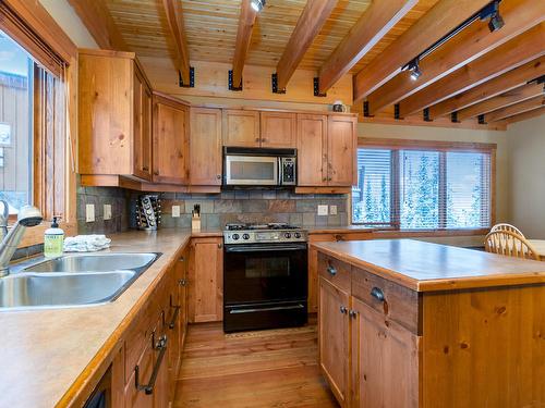 105 Forest Lane, Big White, BC - Indoor Photo Showing Kitchen With Double Sink