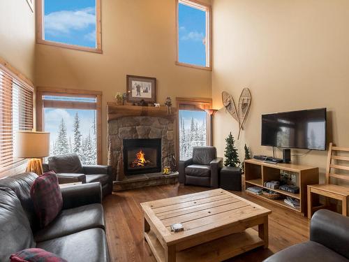 105 Forest Lane, Big White, BC - Indoor Photo Showing Living Room With Fireplace