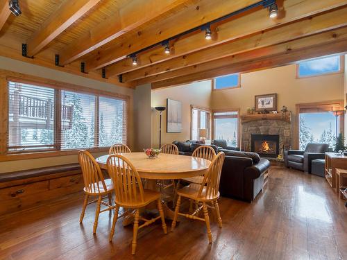 105 Forest Lane, Big White, BC - Indoor Photo Showing Dining Room With Fireplace