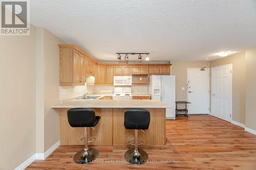 406 - 12 St Andrew Street, Norfolk (Port Dover), ON - Indoor Photo Showing Kitchen With Double Sink