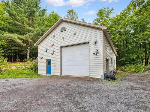 Garage - 27 Ch. Des Merisiers, Val-Des-Monts, QC - Outdoor With Exterior