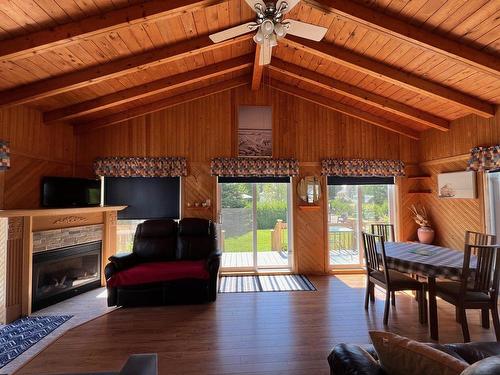 Living room - 36 Rue Bourg, Carleton-Sur-Mer, QC - Indoor With Fireplace