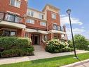 1-2480 Post Rd, Oakville, ON  - Outdoor With Facade 