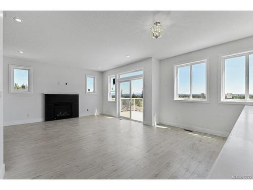 2204 Dodds Rd, Nanaimo, BC - Indoor Photo Showing Living Room With Fireplace