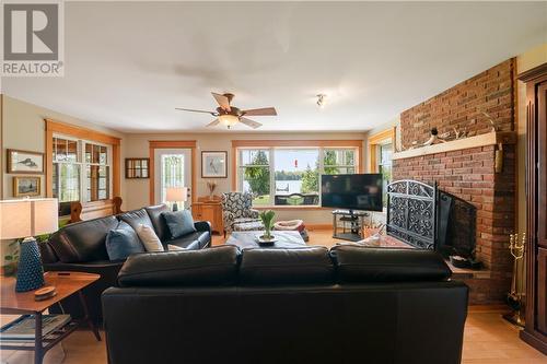 1022A Coutlee Point Lane, Sharbot Lake, ON - Indoor Photo Showing Living Room With Fireplace