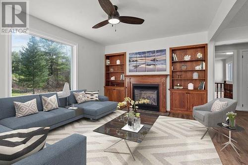 17 Kenney Road, Elgin, ON - Indoor Photo Showing Living Room With Fireplace