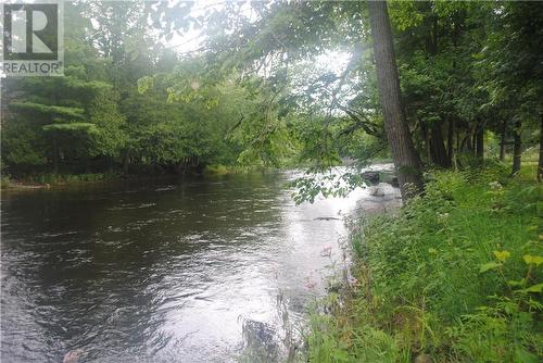 1505 Sheridan Rapids Road, Lanark Highlands, ON - Outdoor With Body Of Water With View