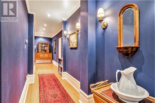 Elegant hallway on main floor leading to 3 pc bath - 212 Franks Road, Rideau Lakes, ON - Indoor Photo Showing Other Room