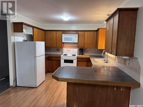 213 & 215 1St Avenue Sw, Leroy, SK - Indoor Photo Showing Kitchen With Double Sink