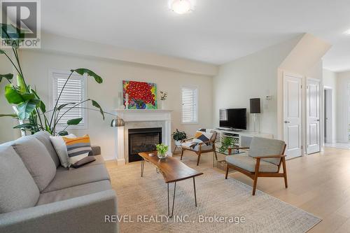 35 Cannery Drive, Niagara-On-The-Lake, ON - Indoor Photo Showing Living Room With Fireplace