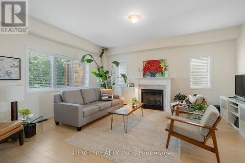 35 Cannery Drive, Niagara-On-The-Lake, ON - Indoor Photo Showing Living Room With Fireplace