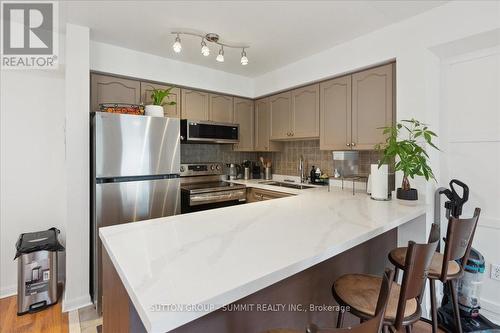 2122 - 115 George Appleton Way, Toronto (Downsview-Roding-Cfb), ON - Indoor Photo Showing Kitchen With Stainless Steel Kitchen With Double Sink