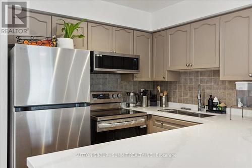 2122 - 115 George Appleton Way, Toronto (Downsview-Roding-Cfb), ON - Indoor Photo Showing Kitchen With Stainless Steel Kitchen With Double Sink