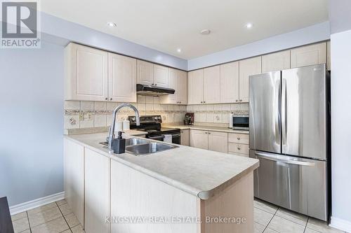 12 Tanglemere Crescent, Brampton (Fletcher'S Meadow), ON - Indoor Photo Showing Kitchen With Double Sink