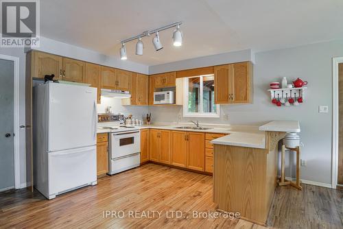 1007 Omineca Road 6 Road, Muskoka Lakes, ON - Indoor Photo Showing Kitchen With Double Sink