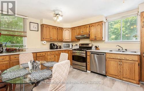 3318 Given Lane, Milton, ON - Indoor Photo Showing Kitchen With Double Sink