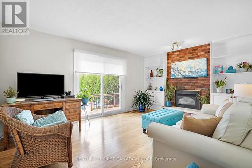 1020 Flintlock Road, London, ON - Indoor Photo Showing Living Room With Fireplace