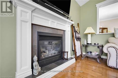 6517 Beattie Street, London, ON - Indoor Photo Showing Living Room With Fireplace