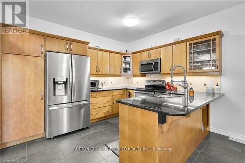 6517 Beattie Street, London, ON - Indoor Photo Showing Kitchen With Double Sink